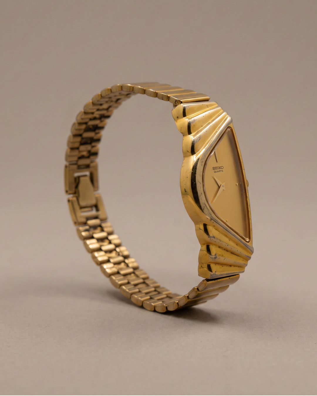Seiko Half Moon Gold — left angled view