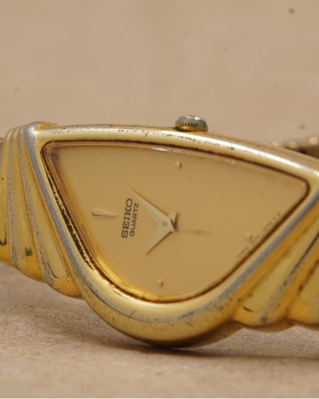 Seiko Half Moon Gold — angled close-up of the Half Moon dial and case
